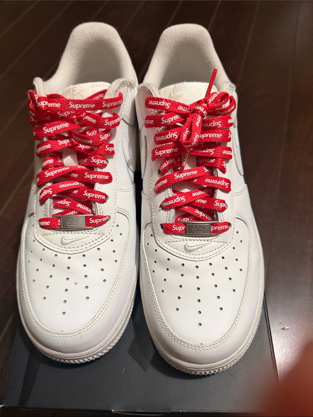 Nike Air Force  White Sneakers with Red Supreme Laces
Size 8.5